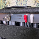 Black Tape Amplifiers Plot Device